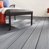 Picture of a lounge chair sitting on top of composite decking for the blog that answers how hot do decks get